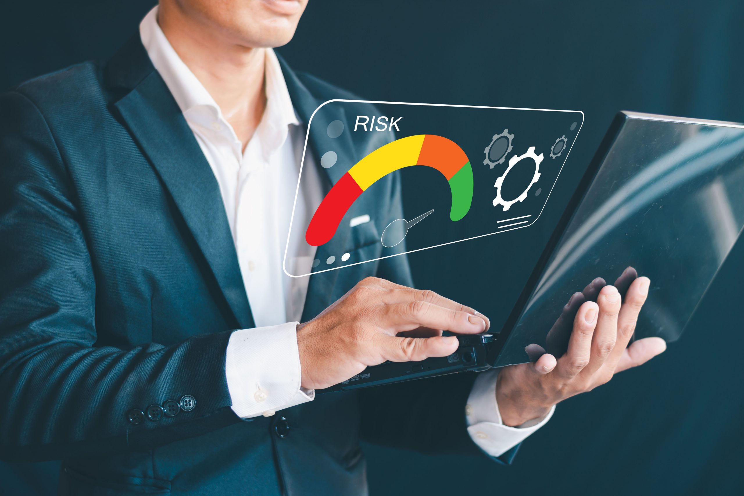 Risk Management Businessman Touching Virtual Risk Level Indicato